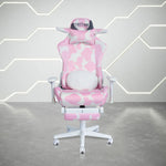Pink and white cow-print gaming chair.