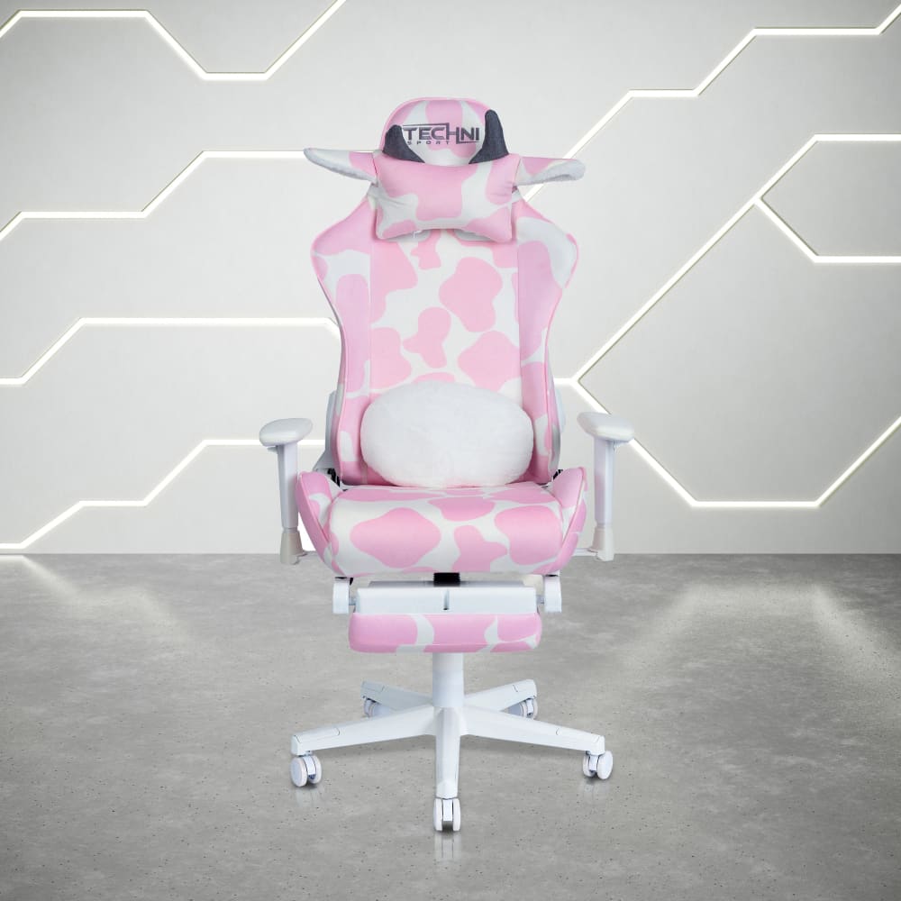 Pink and white cow-print gaming chair.