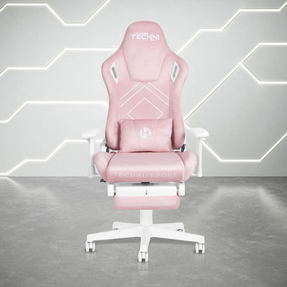 Pink and white gaming chair with a headrest and lumbar pillow.