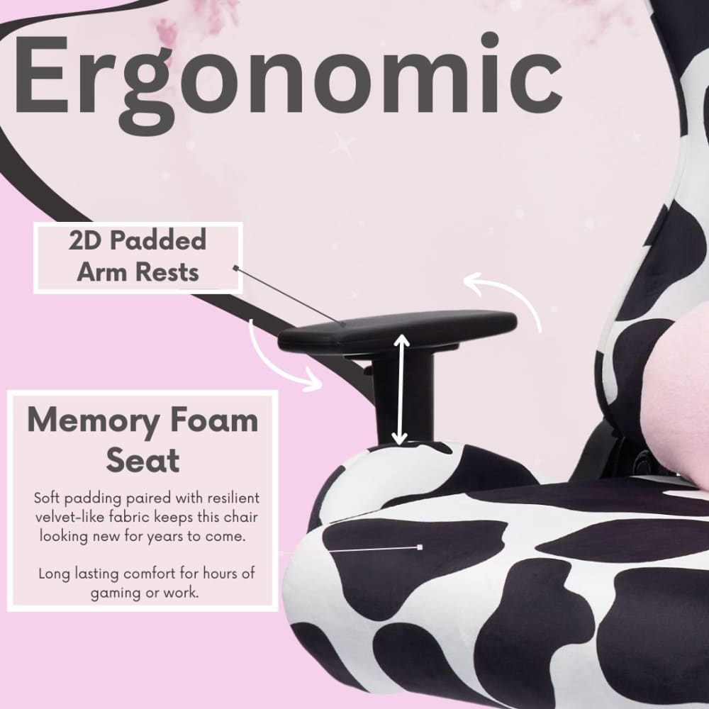 Cow-print ergonomic chair with adjustable armrests and memory foam seat.