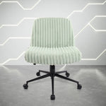 Light green ribbed velvet office chair with a black five-star base and casters.