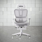 Front view of white gaming chair with footrest, the Airflex 2.0. This is a gaming chair that combines light grey mesh with all white hardware for an all-white look. It features.a footrest that fully tucks under as shown. It also has all white gaming chair rollerblade wheels for easy and comfortable rolling even on carpets. 