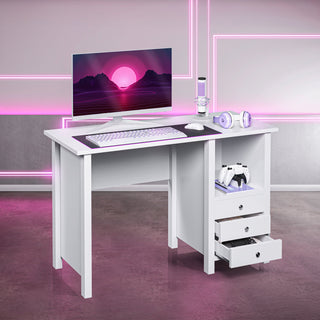 The jaden white gaming desk with drawers displayed with a a monitor, eyboard and accessories. 