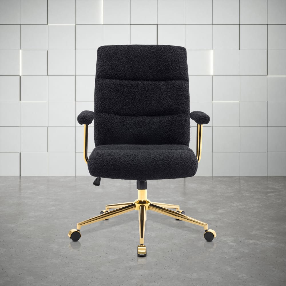 Black sherpa office chair with gold base.