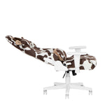 Cow-print adjustable reclining office chair. 