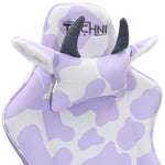 Close up of purple gamimg chair with cow print and pillow with ears and horns. 