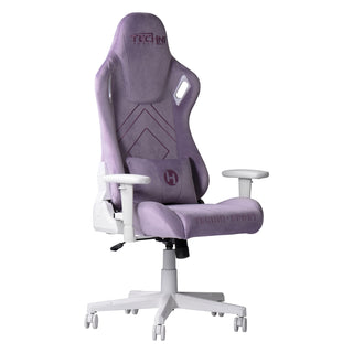 Purple gaming chair shown at an angle against a white background. Features stain resistant velvet like fabric, and a removable velvet purple lumbar pillow