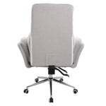 Back view of grey boucle criss cross chair with extra wide tufted backrest 