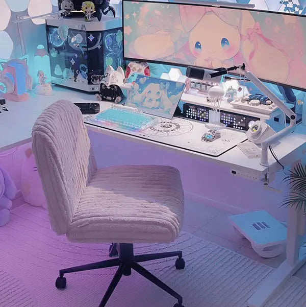 pink criss cross chair in a light pink gaming setup