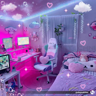 The kawaii gaing chair displayed in a blue and pink gaming setup by @ohayoukitten. 