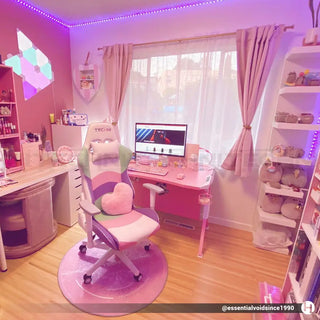 The kawaii gaming chair displayed in a cozy pink gaming setup by @essentialvoidsince1990. 