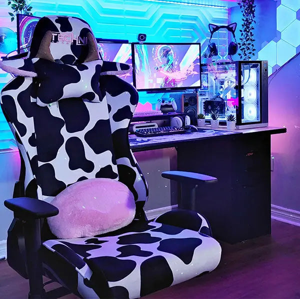 technisport cow gaming chair in an aesthetic gaming setup with LED lights