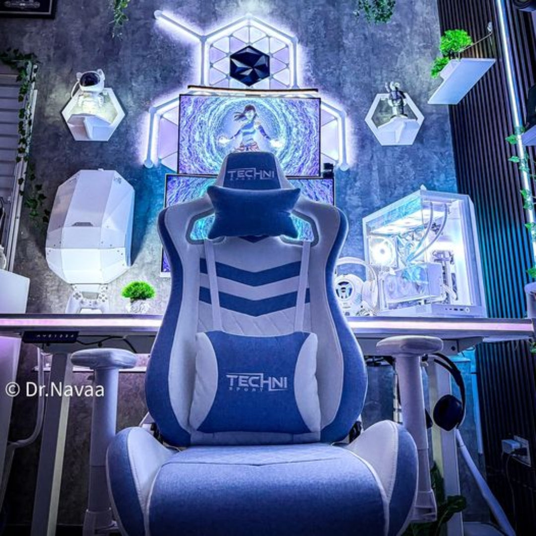 Blue and white gaming chair with 'Techni' branding in a modern room setup. 